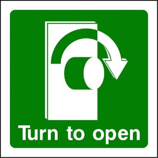 Picture of "Fire Exit- Turn To Open -Clockwise Arrow" Sign 