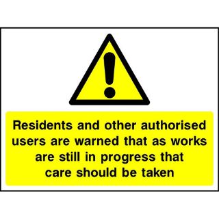 Picture of "Residents And Other Authorised Users Are Warned That As Works Are Still In Progress That Care Should Be Taken" Sign