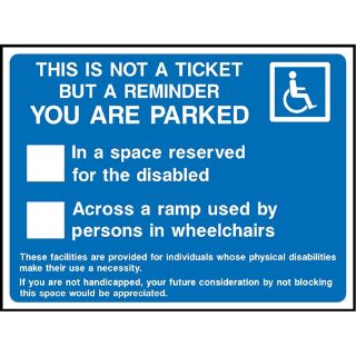 Picture of "This Is Not A Ticket But A Reminder You Are Parked * In A Space Reserved For The Disabled- * Across A Ramp Used By Persons In Wheelchairs" Sign 