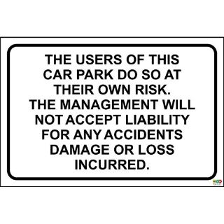 Picture of The Users Of This Car Park Do So At There On Risk Sign