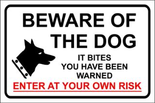 Picture of Beware of the dog It bites you have been warned security enter at your own risk 